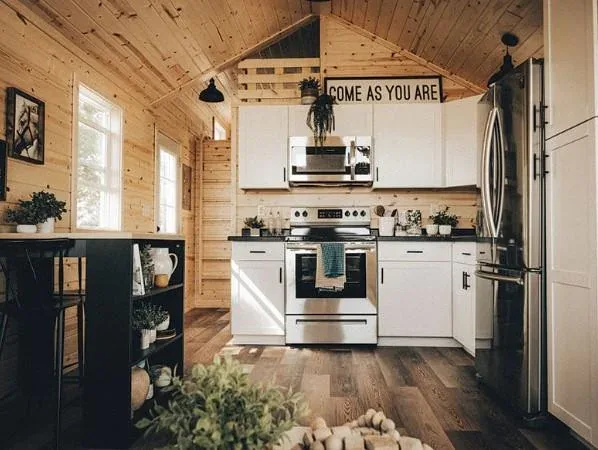 The Trailblazer kitchen with full-size appliances and wood finishes