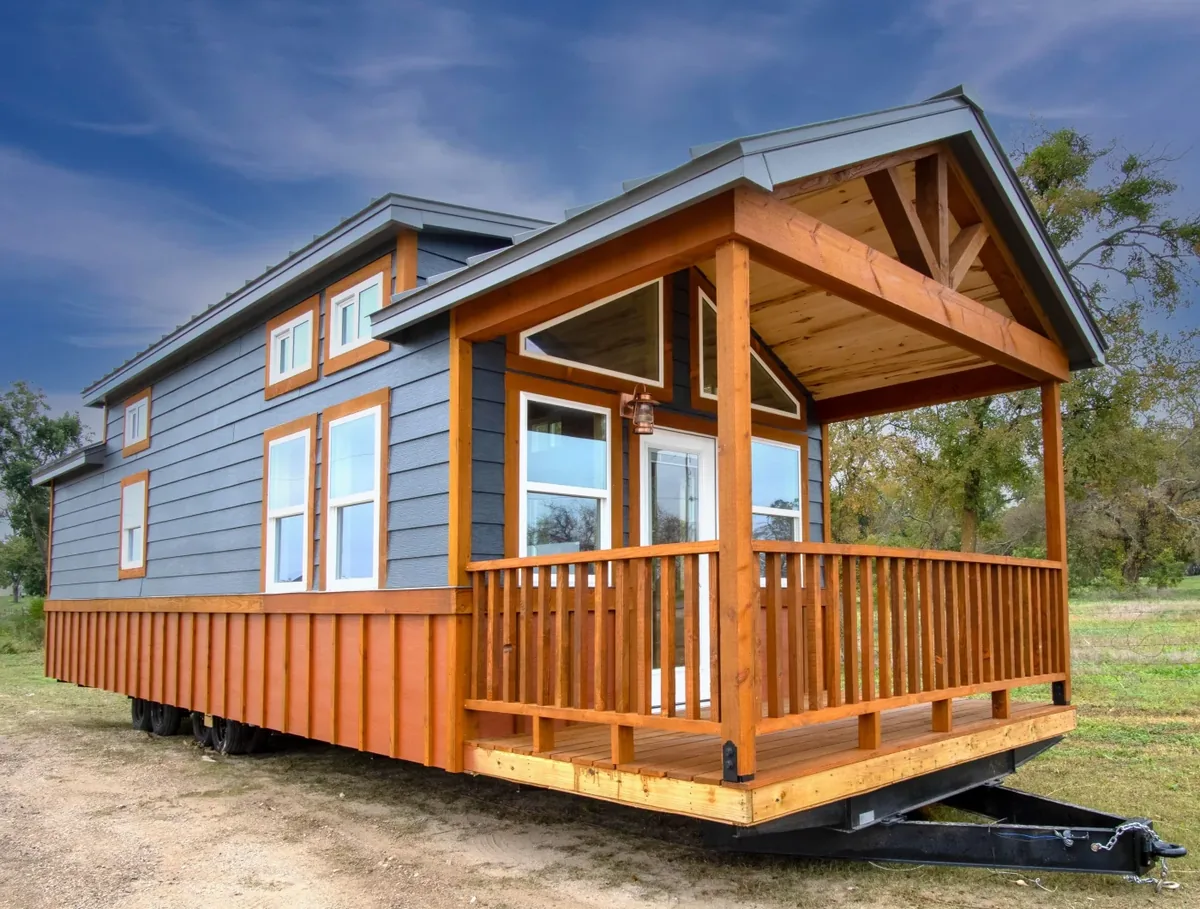 A Trailblazer park model tiny home exterior with porch
