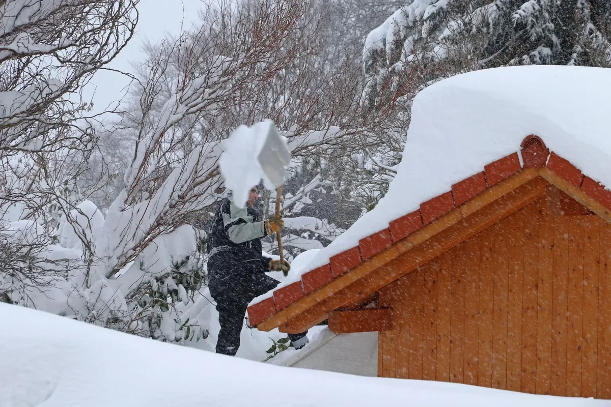 Tiny homes standing strong under deep winter snow